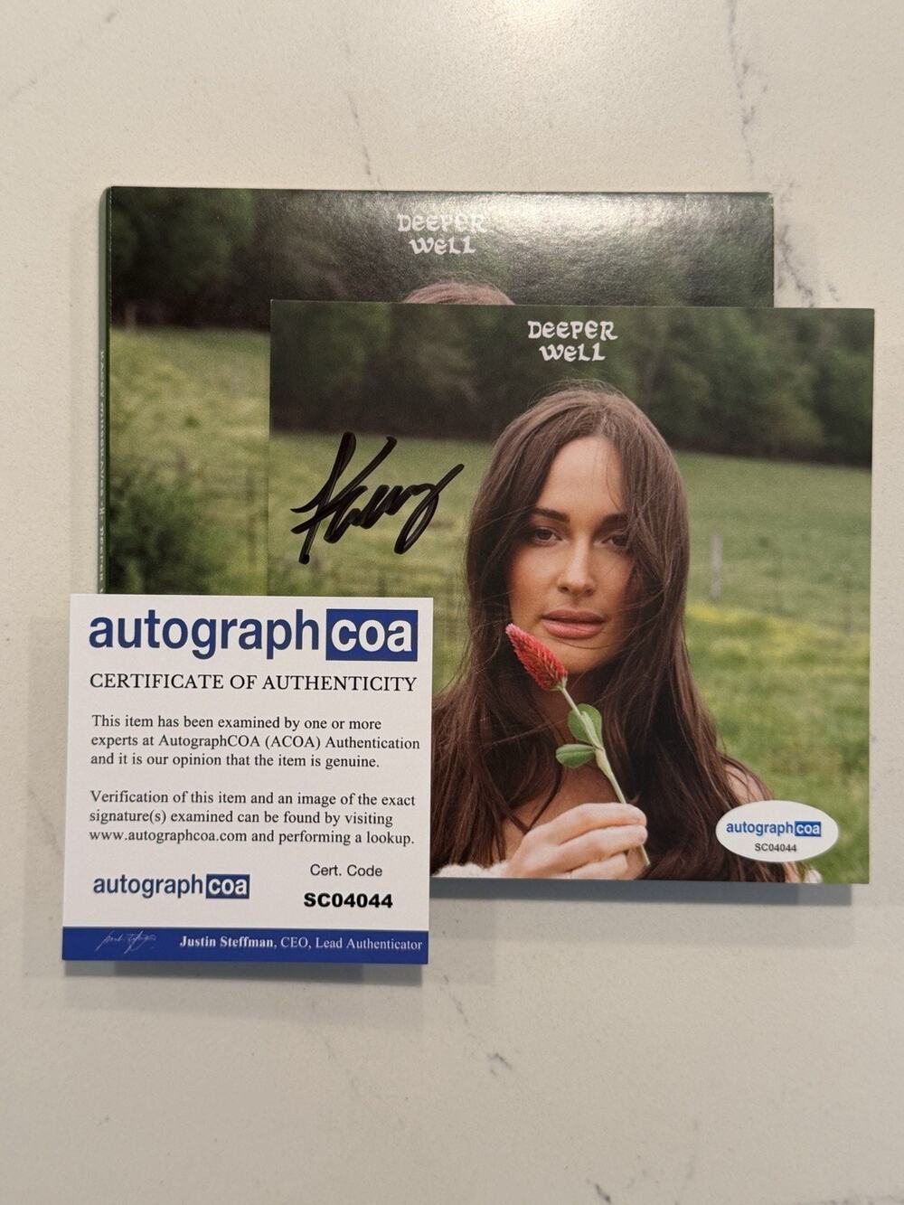 Kacey Musgraves SIGNED Autographed Deeper Well CD COA ACOA #5